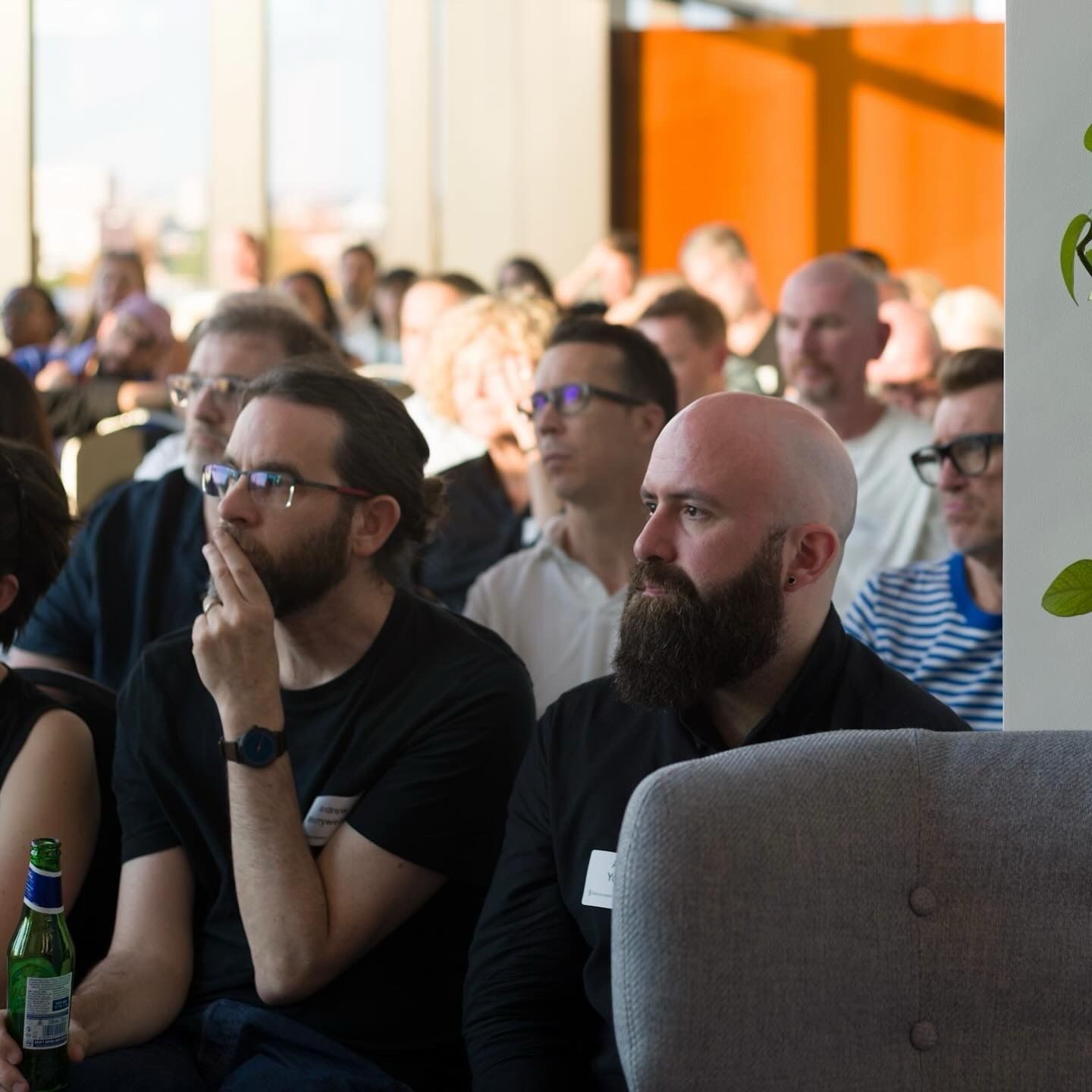 Design leaders listening in the audience at a previous Design Leaders event