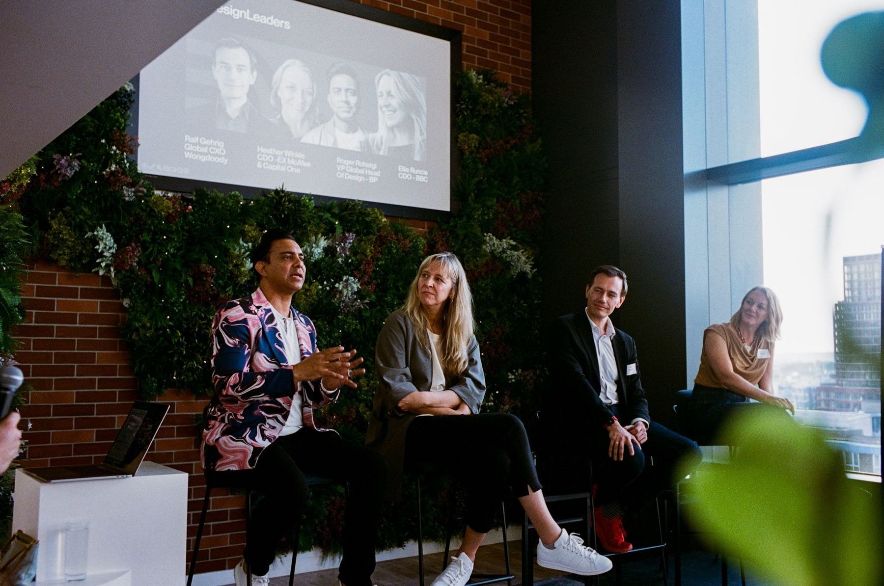 A Design Leaders panel on stage, in front of the community